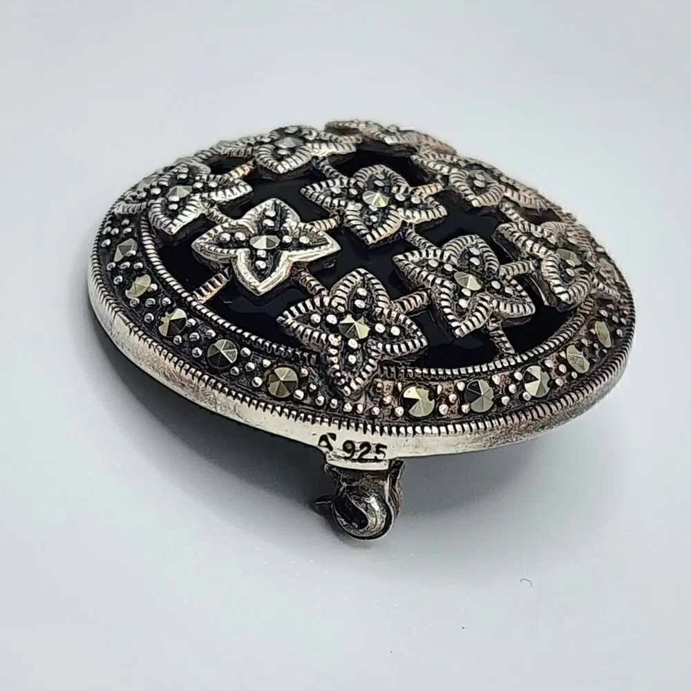Vintage sterling silver black onyx marcasite brooch